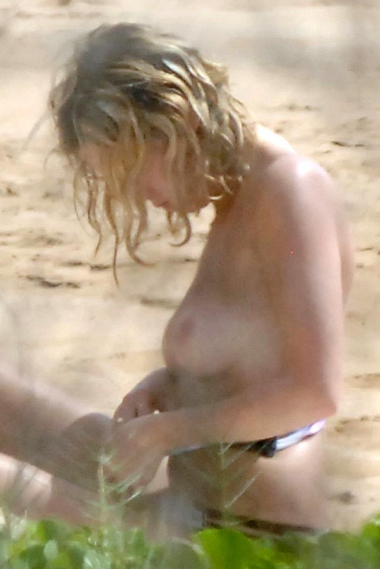 Ashley Benson Topless For Sun At Beach 6