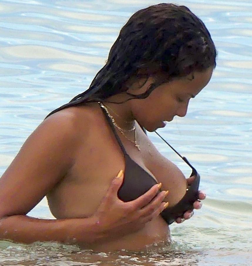 Christina Milian Flashes Nipple At Beach 1
