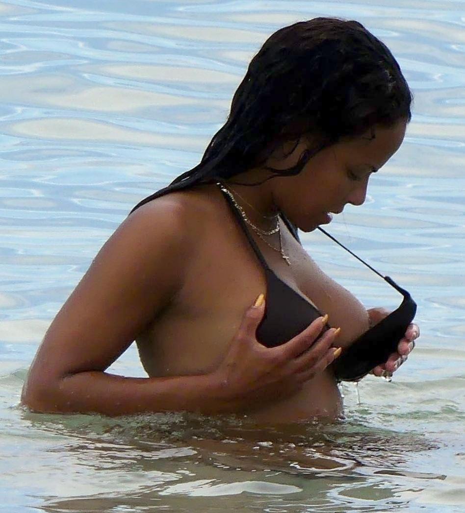 Christina Milian Flashes Nipple At Beach 3