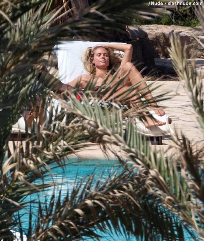 Heidi Klum Topless For A Tan In Spain 2