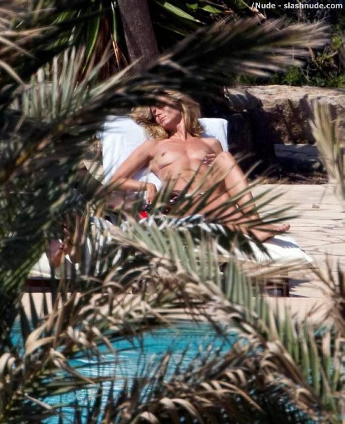Heidi Klum Topless For A Tan In Spain 3
