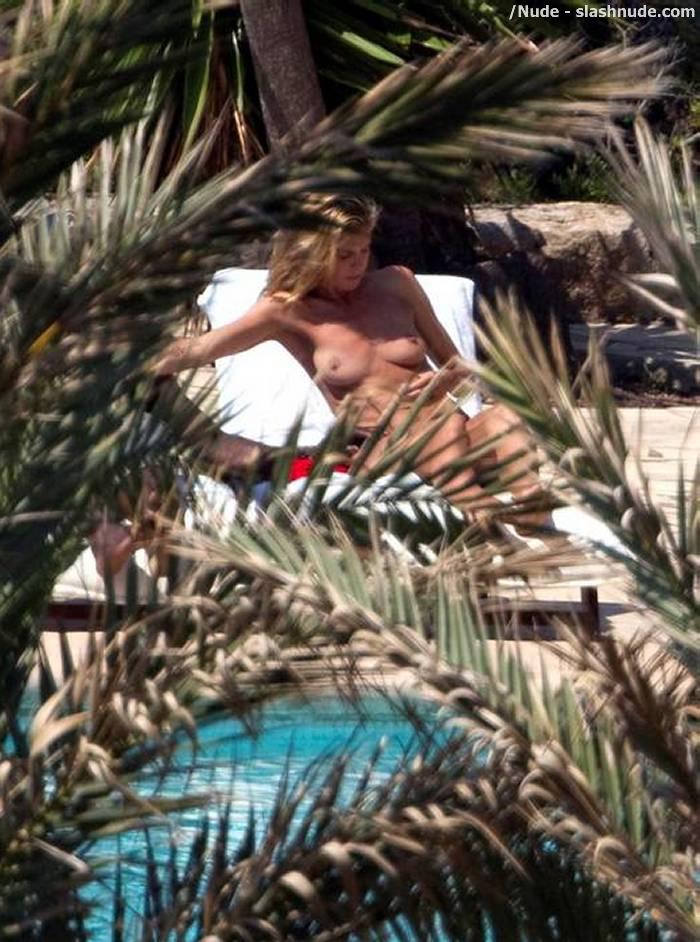 Heidi Klum Topless For A Tan In Spain 5