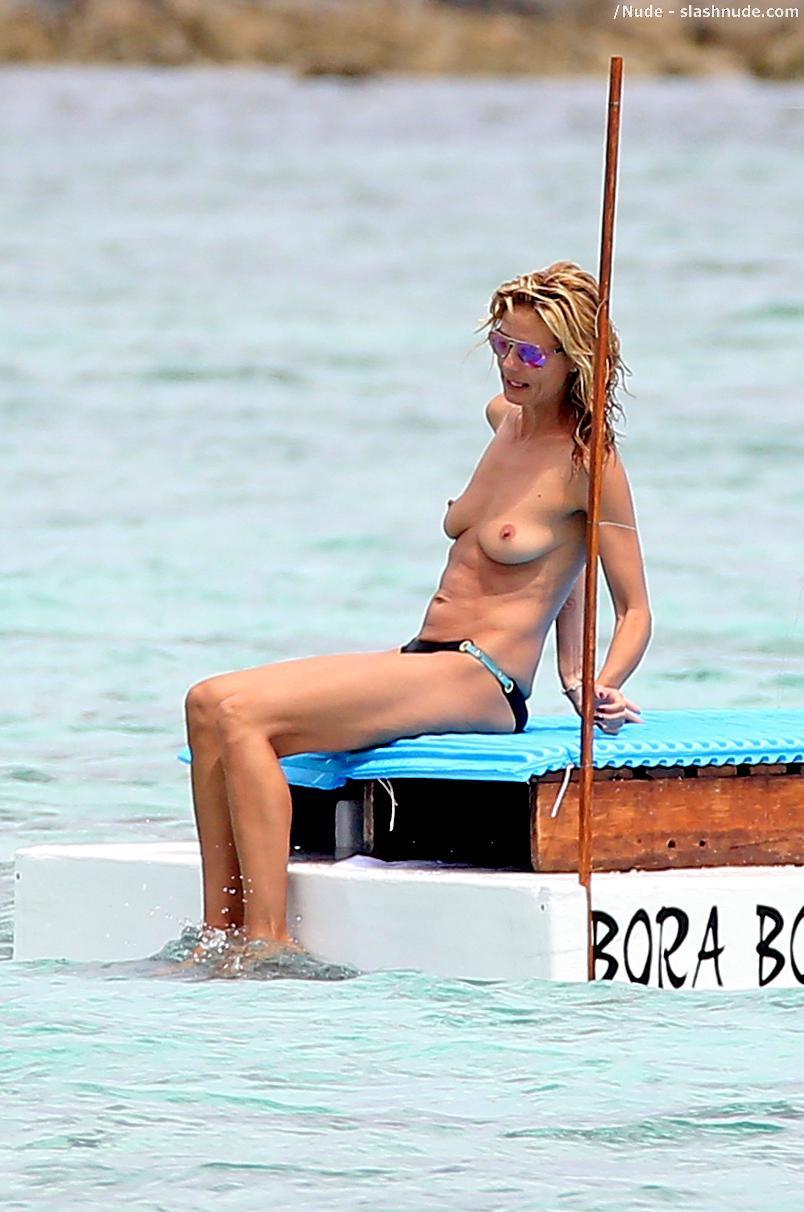 Heidi Klum Topless In Cool Shades At Beach 4