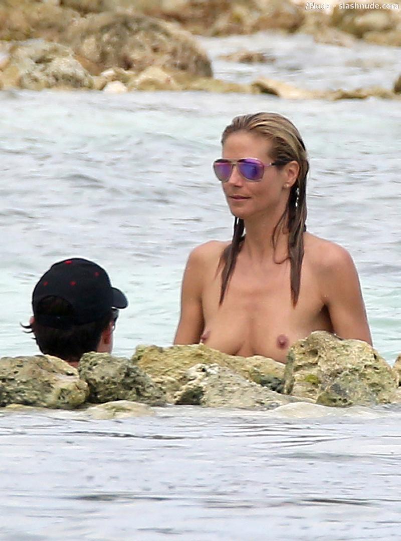 Heidi Klum Topless In Cool Shades At Beach 7