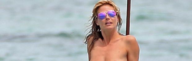 heidi klum topless in cool shades at beach 1425