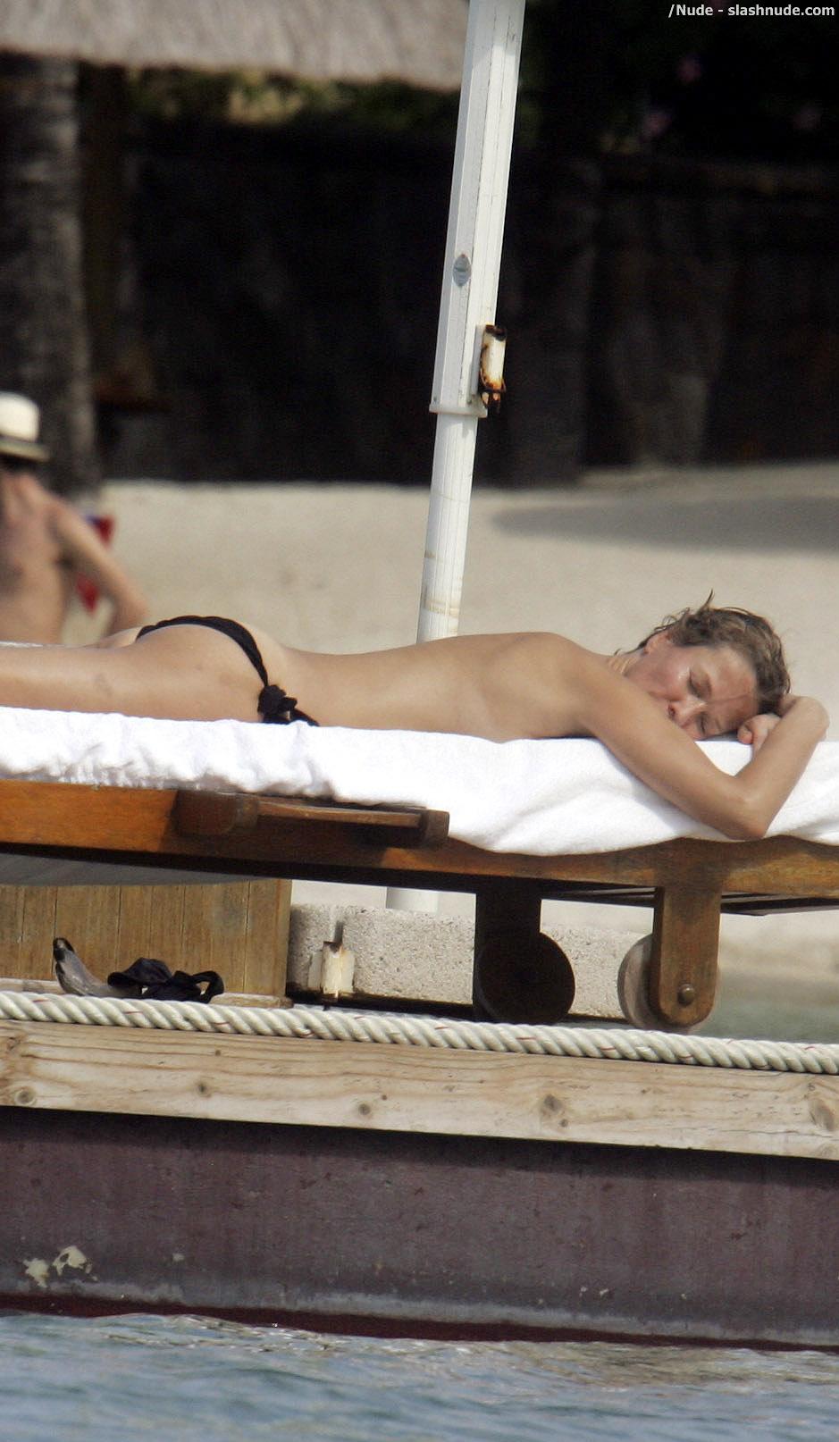 Karen Mulder Topless For A Tan In Mauritius 11
