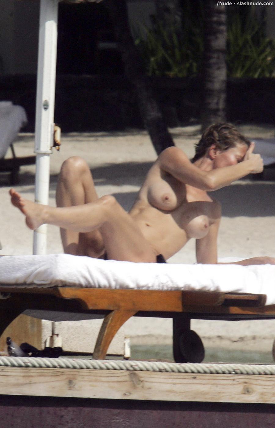 Karen Mulder Topless For A Tan In Mauritius 7