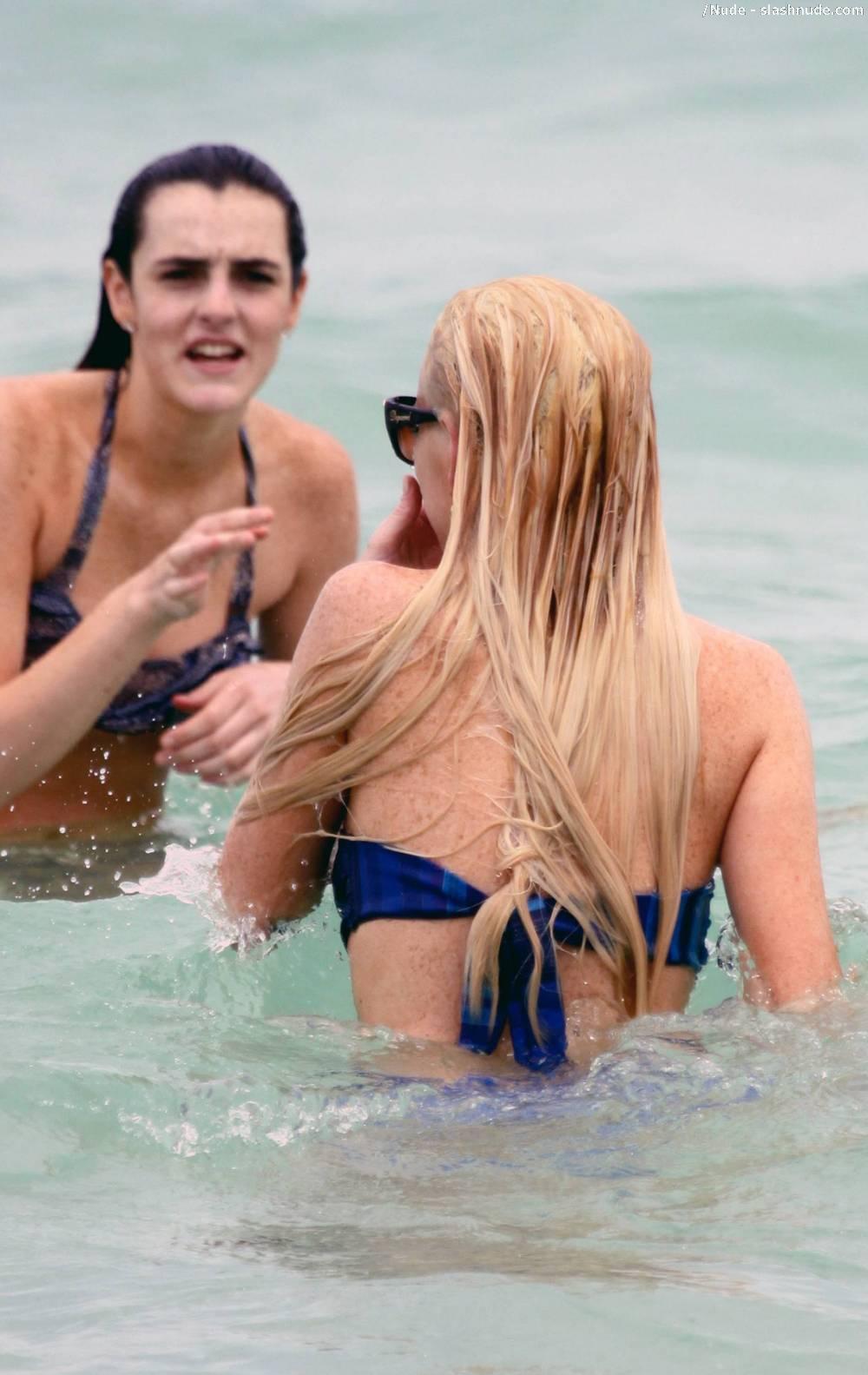 Lindsay Lohan Breasts Slip Of Her Bikini In Miami 10