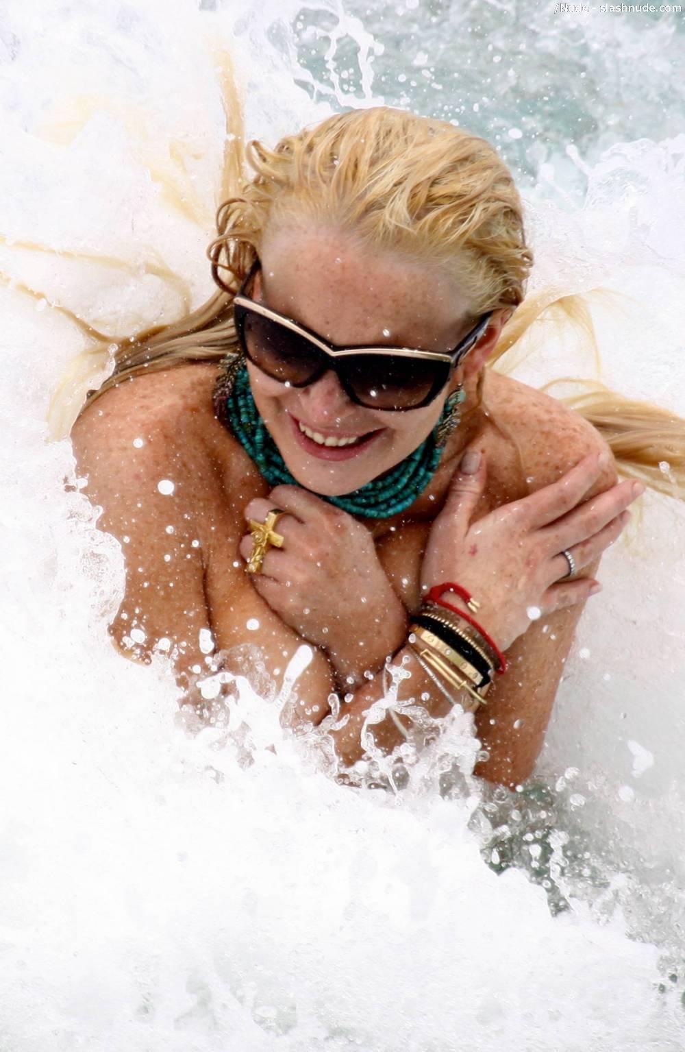 Lindsay Lohan Breasts Slip Of Her Bikini In Miami 7
