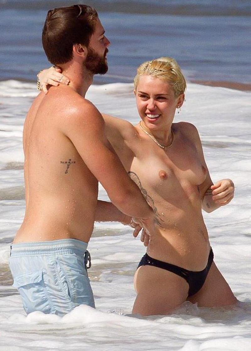 Miley Cyrus Bares Topless Breasts With Boyfriend At Beach 1