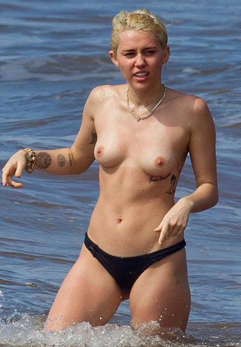 Miley Cyrus Bares Topless Breasts With Boyfriend At Beach 10