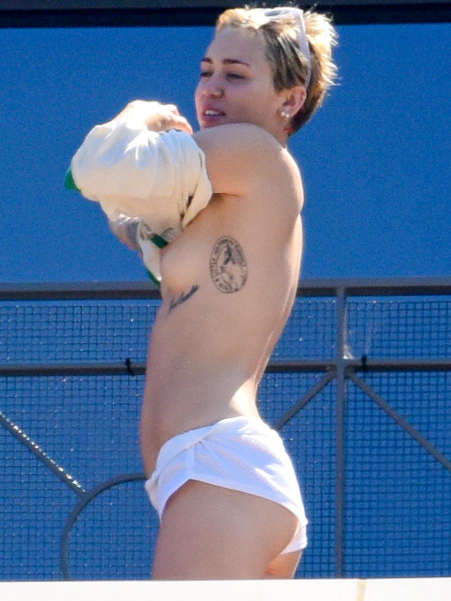 Miley Cyrus Topless On Hotel Balcony In Australia 1