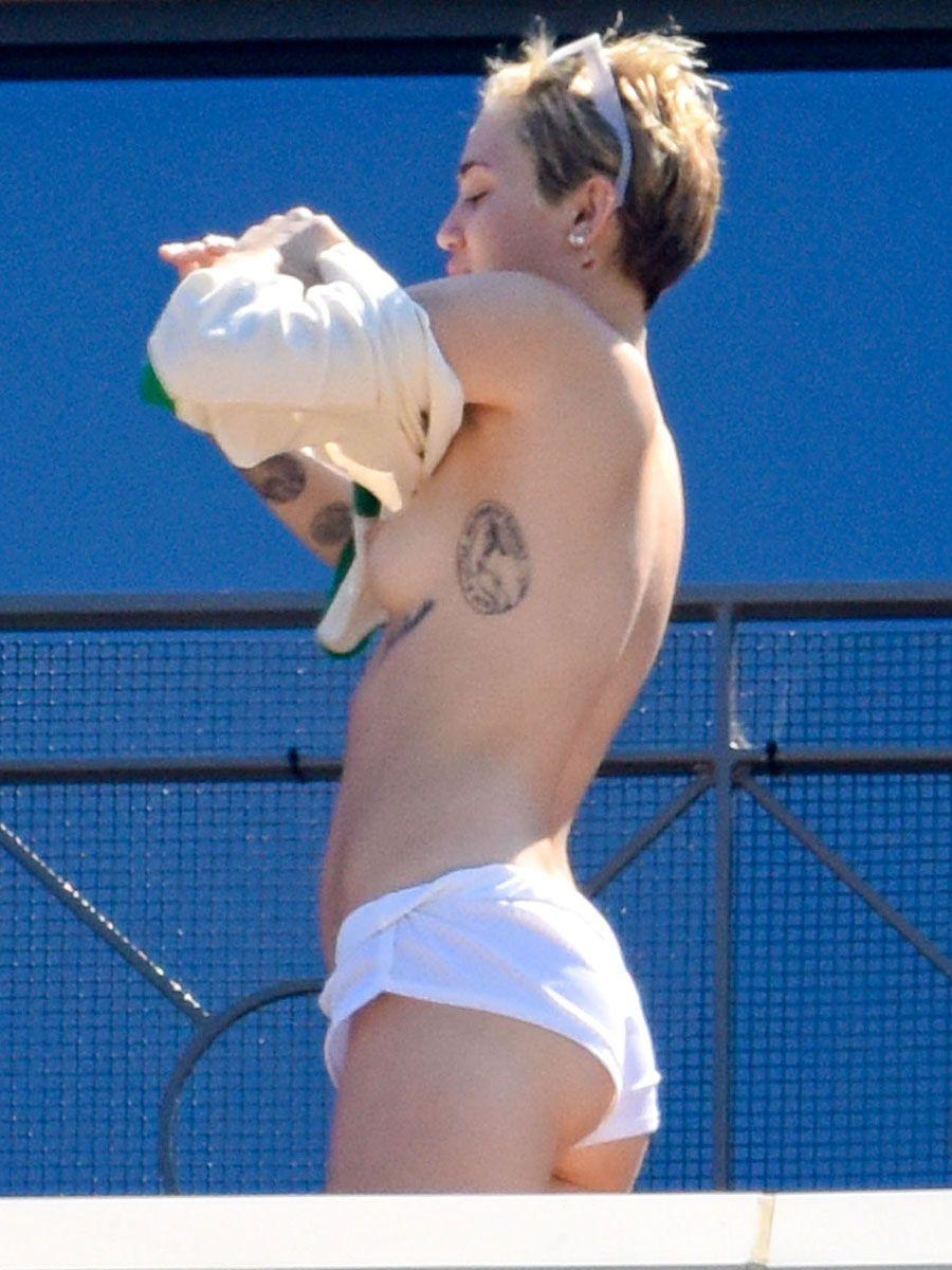 Miley Cyrus Topless On Hotel Balcony In Australia 7