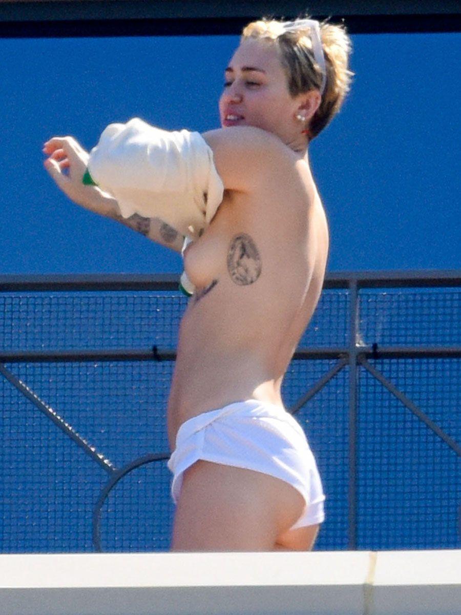 Miley Cyrus Topless On Hotel Balcony In Australia 8