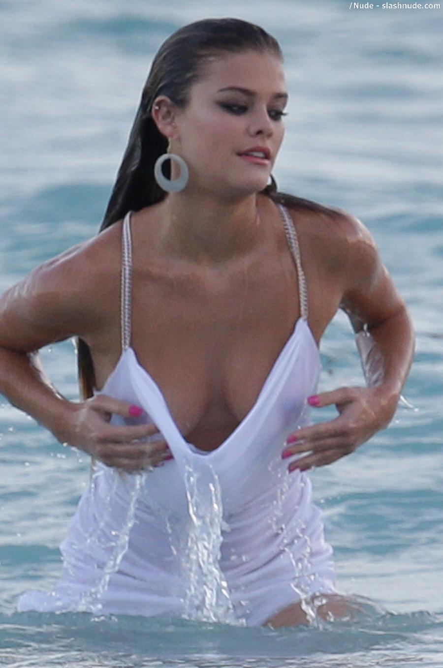 Nina Agdal Breast Slips Out During Beach Shoot 10