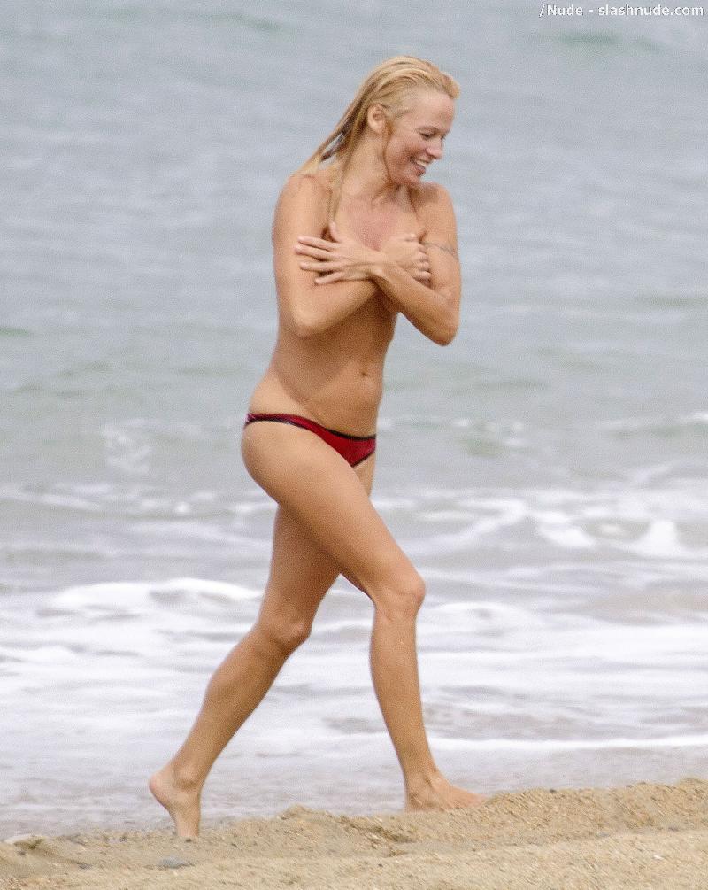 Pamela Anderson Topless Run At French Beach 11