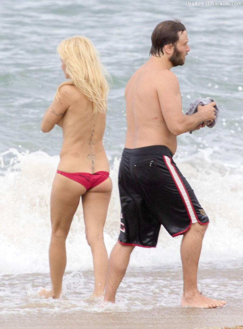 Pamela Anderson Topless Run At French Beach 12
