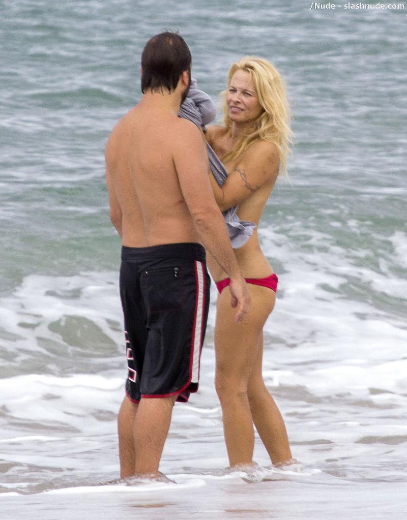 Pamela Anderson Topless Run At French Beach 13