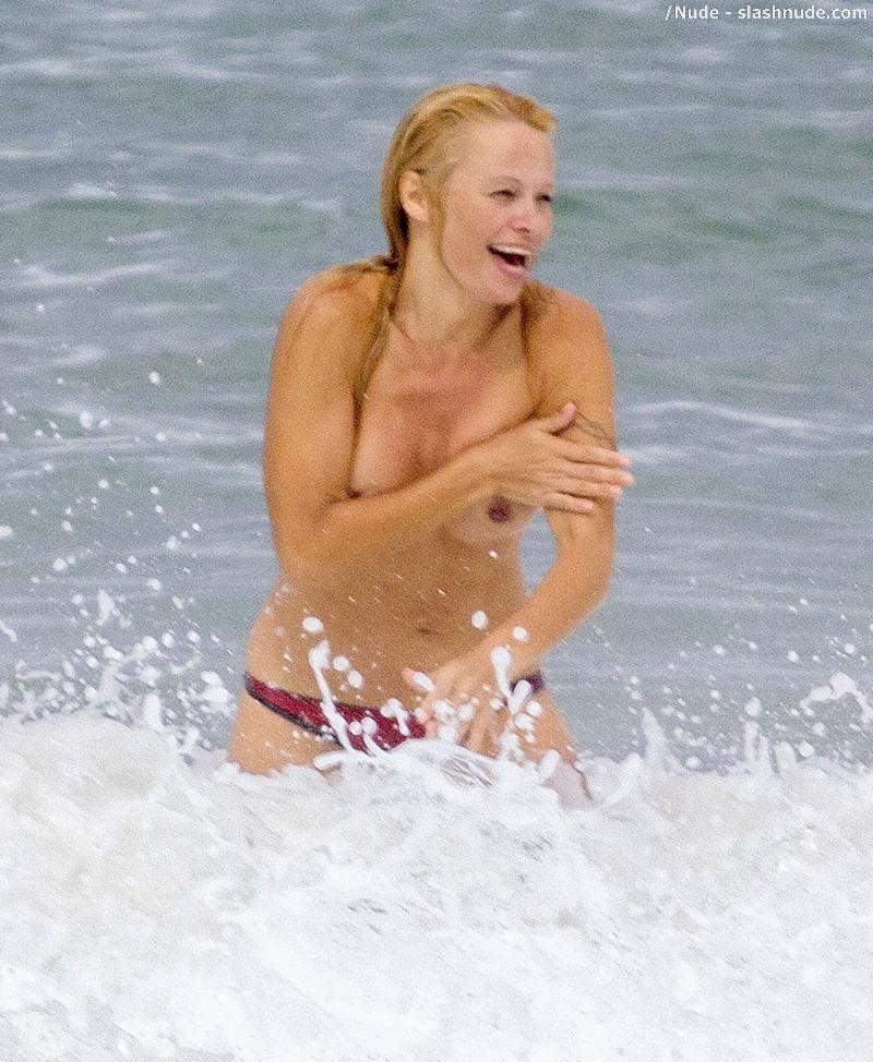 Pamela Anderson Topless Run At French Beach 4