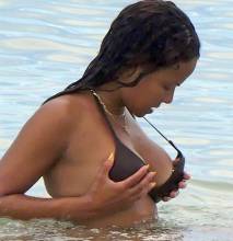 christina milian flashes nipple at beach 5379 1
