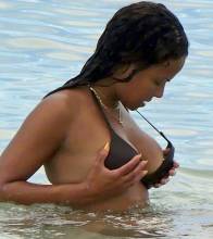 christina milian flashes nipple at beach 5379 2