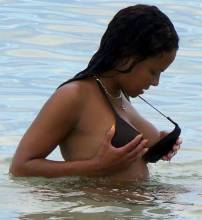 christina milian flashes nipple at beach 5379 3