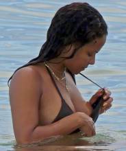 christina milian flashes nipple at beach 5379 5