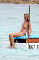 heidi klum topless in cool shades at beach 1425 4