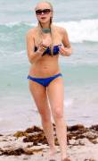 lindsay lohan breasts slip of her bikini in miami 3767 14