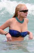 lindsay lohan breasts slip of her bikini in miami 3767 4