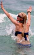 lindsay lohan breasts slip of her bikini in miami 3767 9