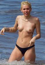 miley cyrus bares topless breasts with boyfriend at beach 3085 10