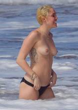 miley cyrus bares topless breasts with boyfriend at beach 3085 2