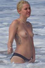 miley cyrus bares topless breasts with boyfriend at beach 3085 6