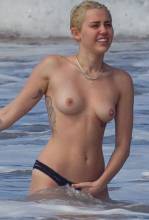 miley cyrus bares topless breasts with boyfriend at beach 3085 7