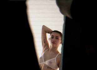 miley cyrus breasts bared behind scenes of adore you 5831 5