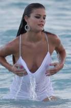 nina agdal breast slips out during beach shoot 1447 10