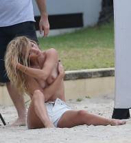 rosie huntington whiteley topless for photo shoot at beach 2105 7