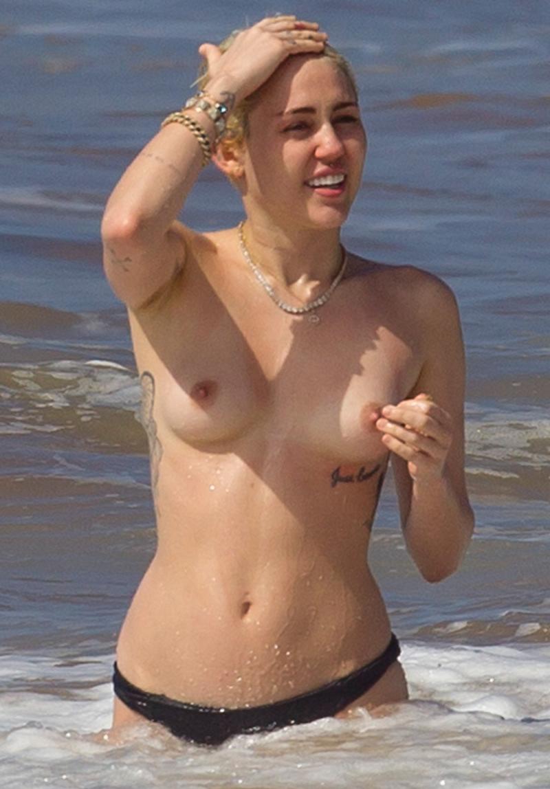 Miley Cyrus Bares Topless Breasts With Boyfriend At Beach 8