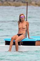 heidi klum topless in cool shades at beach 1425 3