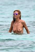 heidi klum topless in cool shades at beach 1425 8