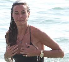 kelly bensimon nipples slip out of top at beach 6553 4