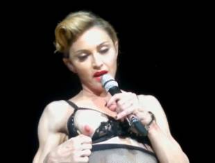 madonna pulls down bra to expose her breast in istanbul 2989 7