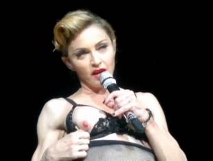 madonna pulls down bra to expose her breast in istanbul 2989 8